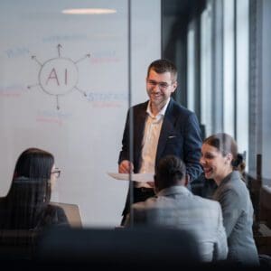 Business meeting discussing AI strategy.